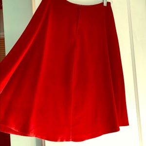 Circle skirt is a rich wine color